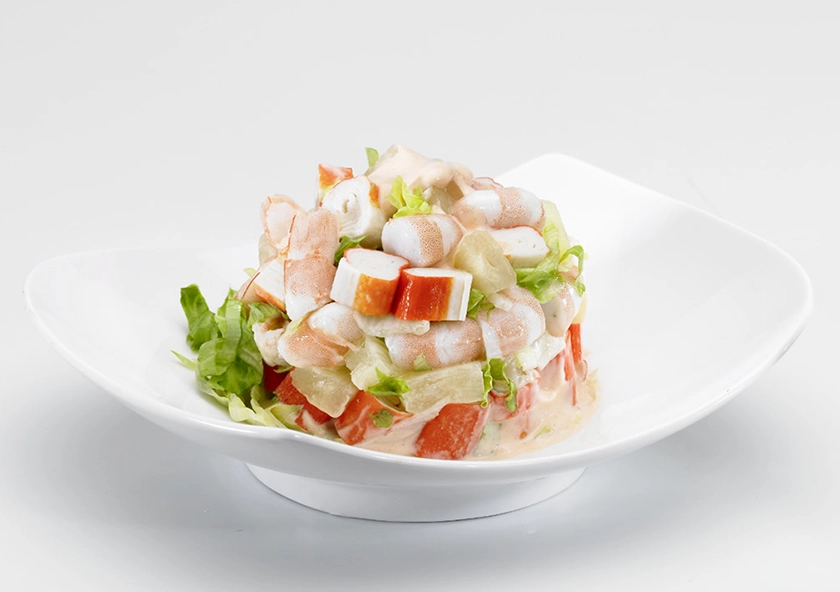 Cóctel de langostinos y palitos de mar