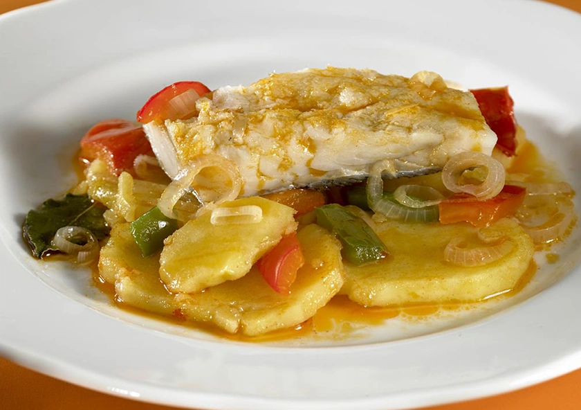 Lomos de bacalao con pimientos