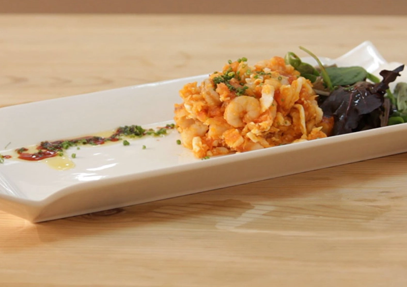 Salpicón de merluza y gambas con vinagreta dulce